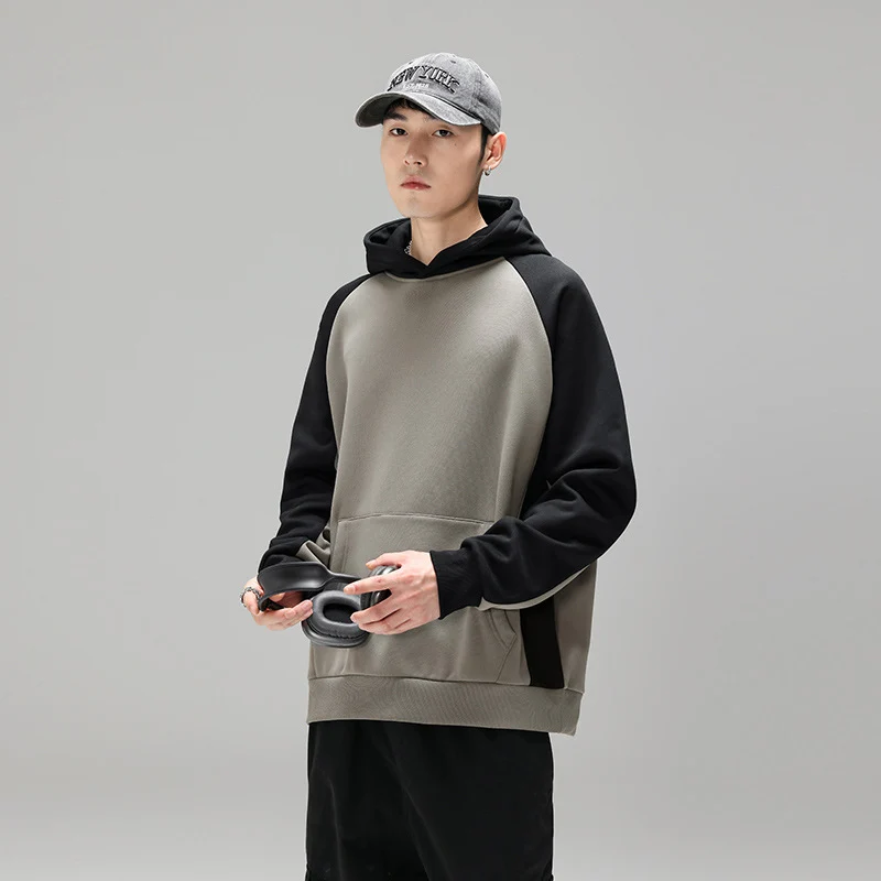 Herren Kapuzenpullover im Colourblock-Design mit Raglanärmeln, Kängurutasche und geripptem Saum Drune