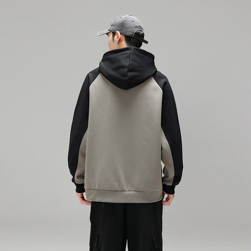 Herren Kapuzenpullover im Colourblock-Design mit Raglanärmeln, Kängurutasche und geripptem Saum Drune