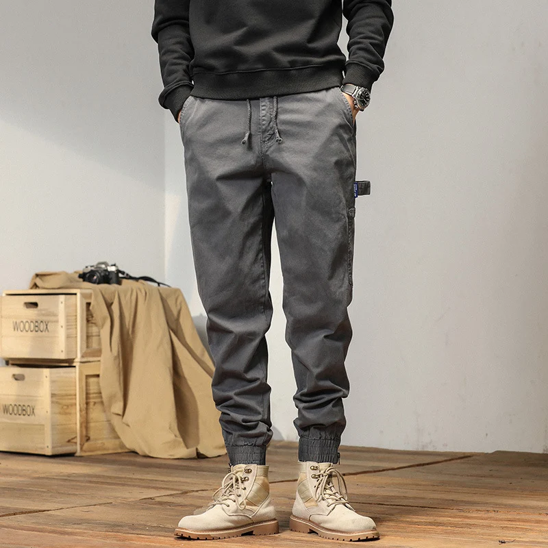Herren Cargo-Jogginghose im Utility-Look mit elastischem Tunnelzugbund und verstärkten Pattentaschen Drune
