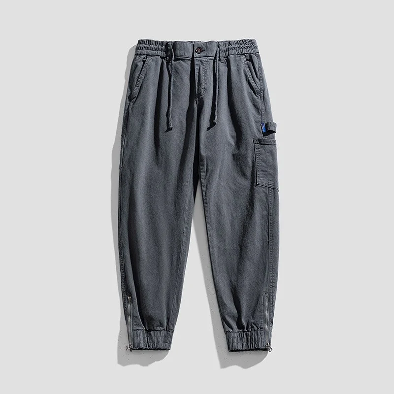 Herren Cargo-Jogginghose im Utility-Look mit elastischem Tunnelzugbund und verstärkten Pattentaschen Drune