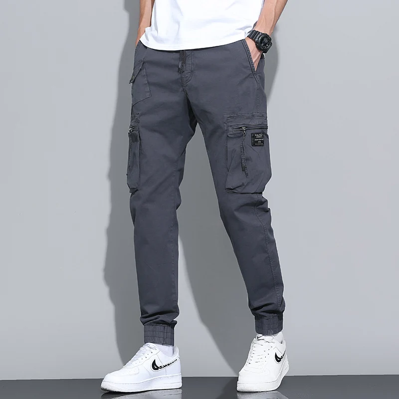 Herren Tapered-Utility-Cargohose mit elastischem Tunnelzugbund, großen Klapp­taschen und gerippten Bündchen Drune