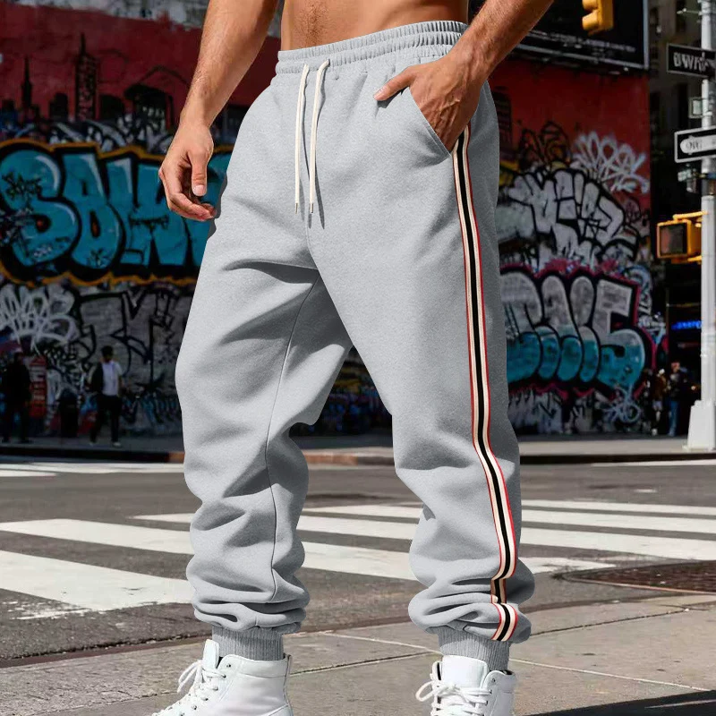 Herren Urbaner Slim-Jogger aus French Terry mit Seitenstreifen und gerippten Bündchen Drune