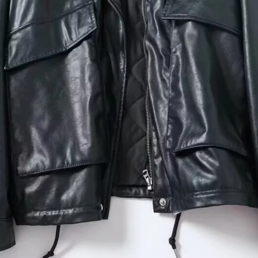 Damen Oversize Kunstlederfliegerjacke mit Teddykragen und Pattentaschen Drune