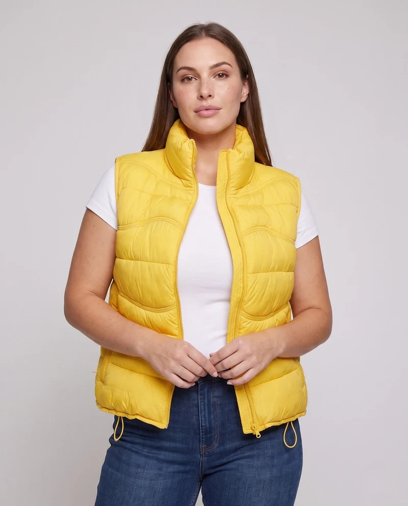 Damen ärmellose thermo gesteppte Weste mit ergonomischer Wellensteppung, hohem Kragen und verstellbarem Kordelzugsaum