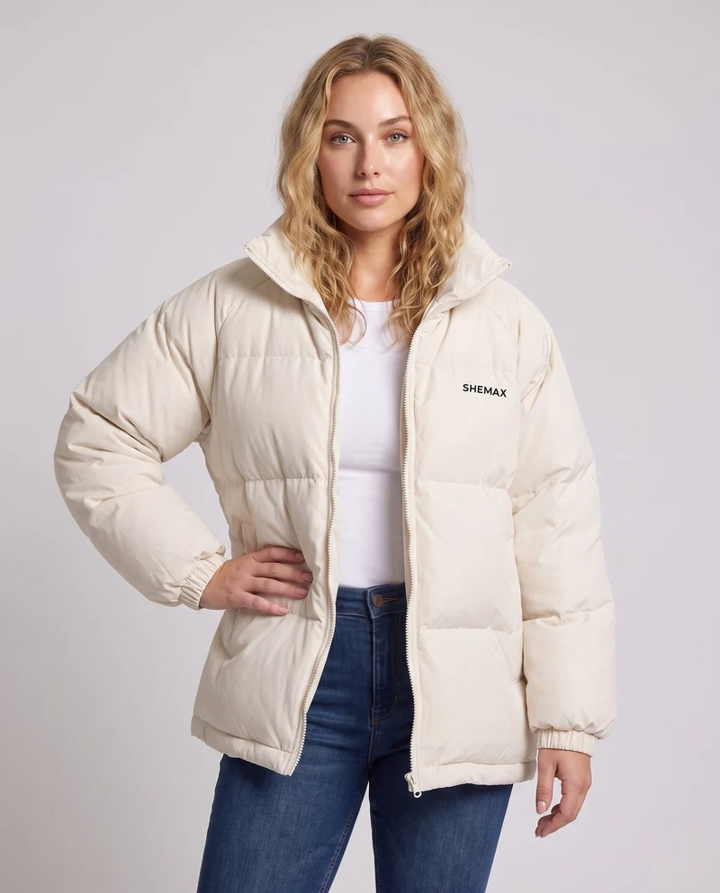 Damen ungefütterte boxy Pufferjacke mit hohem Stehkragen, Raglanärmeln und sauberem Logo