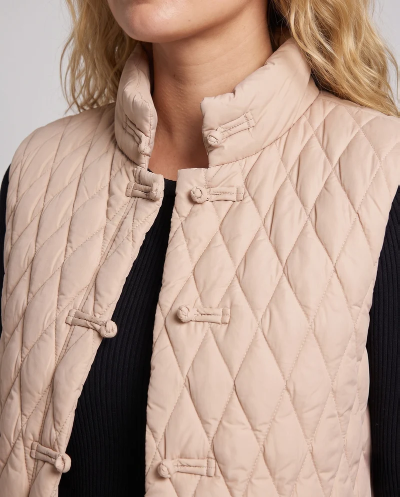 Damen gesteppte ärmellose Jacke mit Stehkragen und dekorativen Knotenschlüssen