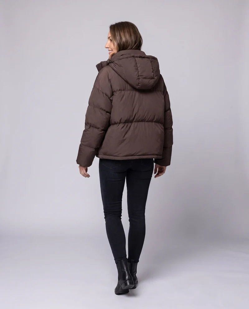 Damen kompakte gesteppte Jacke mit zusätzlicher voluminöser Kapuze und verdeckter Druckknopfblende