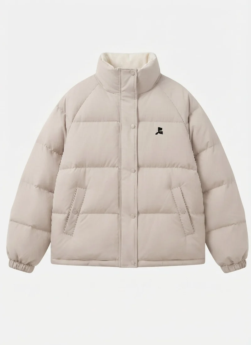 Damen kurze oversized gesteppte Jacke mit hochschließendem Kragen und verdeckter Druckknopfleiste