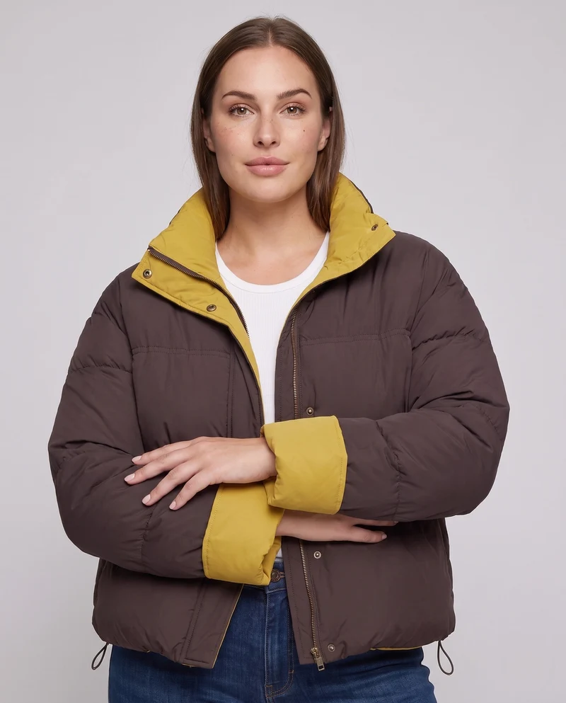Damen kurze gepolsterte boxy Jacke mit Stehkragen und verdeckter Knopfleiste