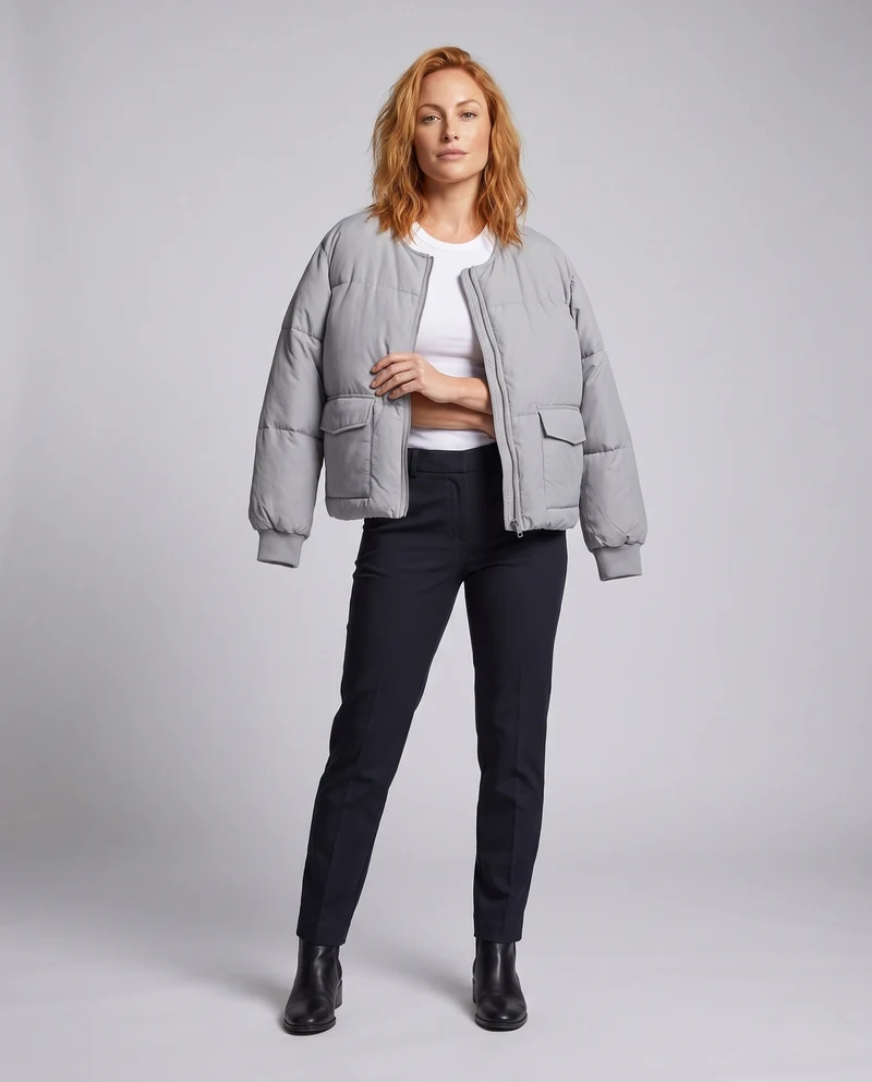Damen kurze boxy gesteppte Jacke mit geradem Schnitt, verdecktem Reißverschluss und elastischen Bündchen