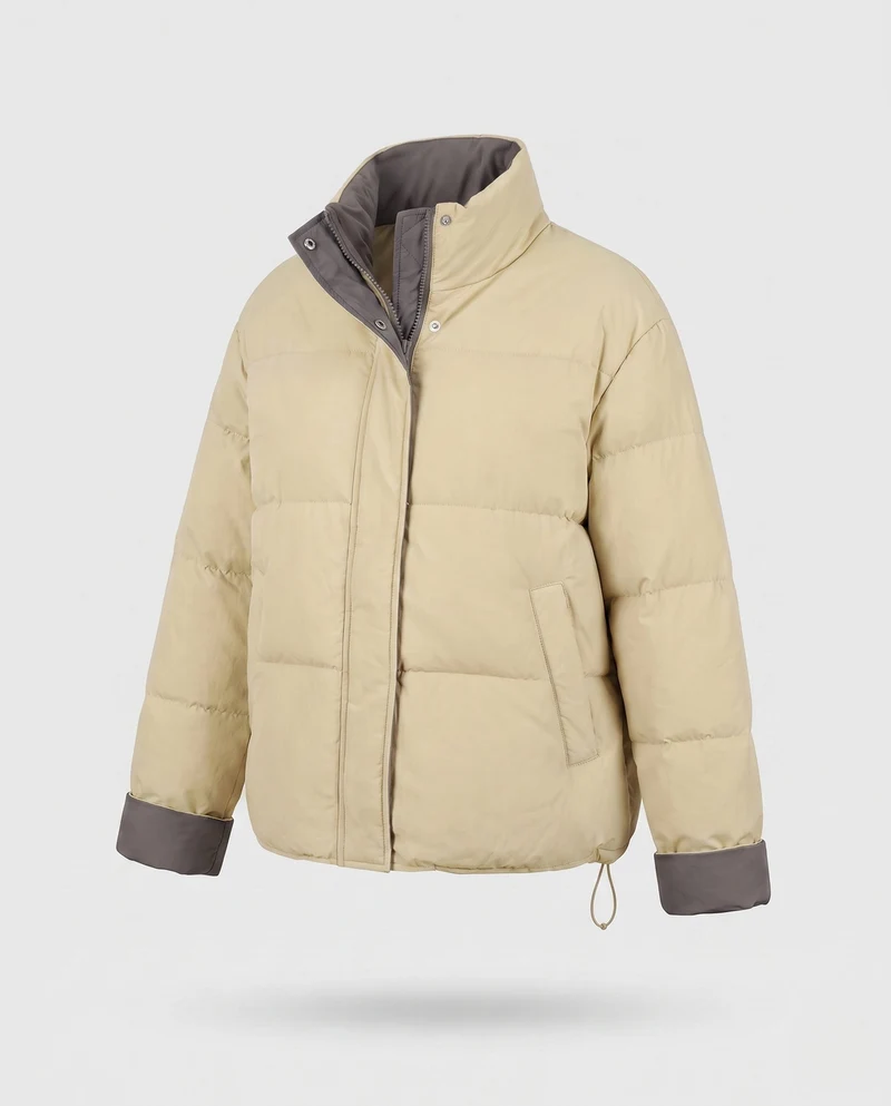 Damen kurze oversized wendbare Pufferjacke mit kontrastierendem Innenrand und Kordelzugsaum