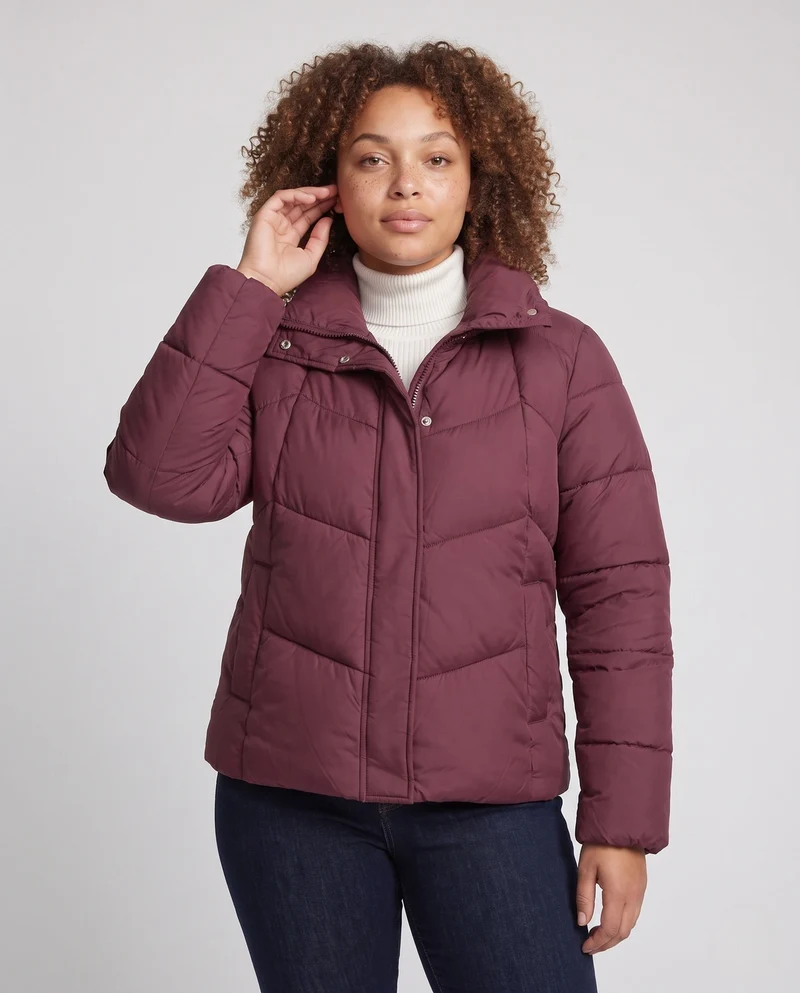 Damen kurze gepolsterte Stadt-Pufferjacke mit diskretem zweifachem Frontreißverschluss und ergonomischer Steppung
