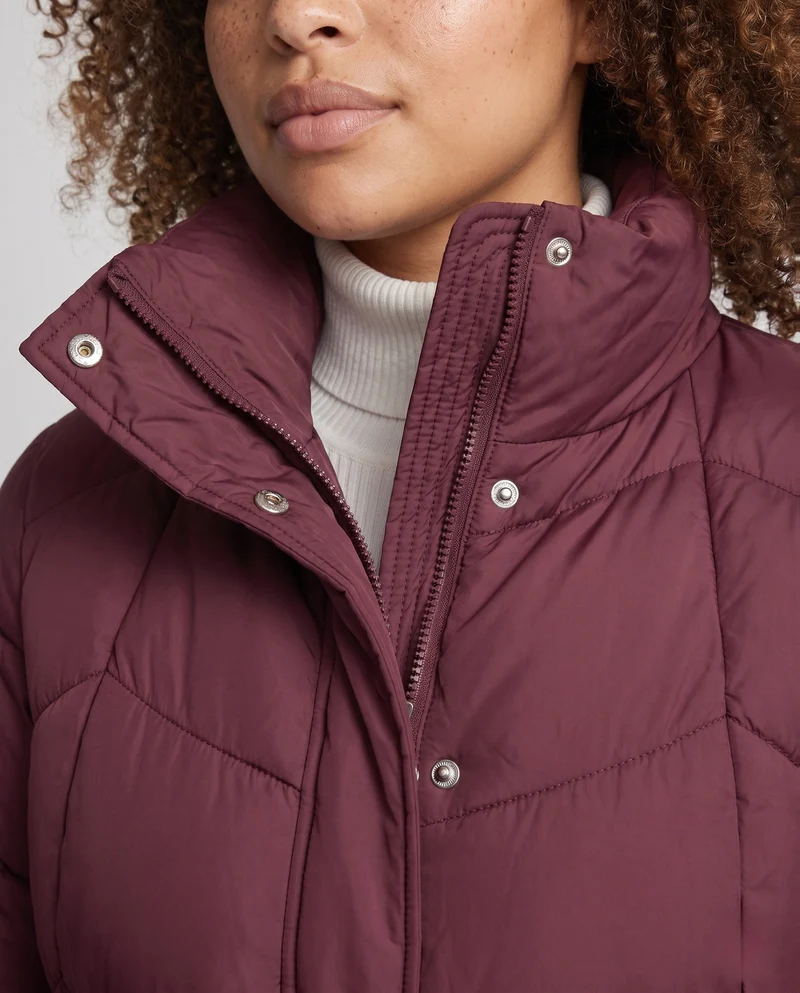 Damen kurze gepolsterte Stadt-Pufferjacke mit diskretem zweifachem Frontreißverschluss und ergonomischer Steppung