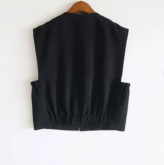 Damen Modische ärmellose Weste mit Knopfdetails Drune
