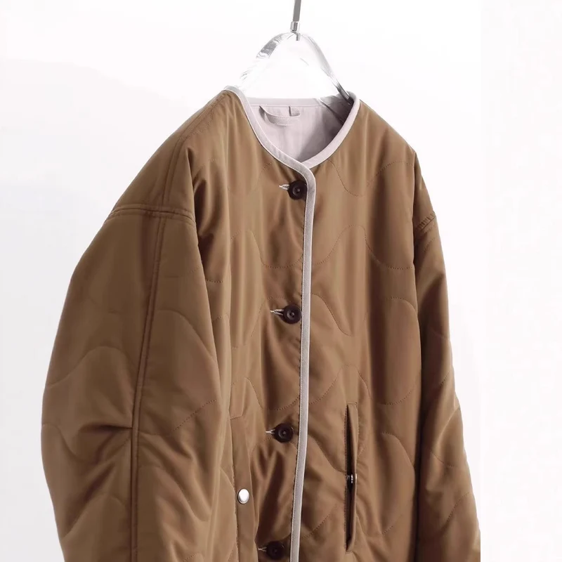 Damen Steppjacke ohne Kragen mit Oversize‑Silhouette und Kontrastpaspel Drune