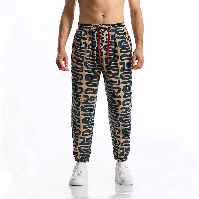 Herren Gemusterte Relaxed-Fit Loungehose mit Tunnelzug, elastischem Bund und Gummibündchen Drune
