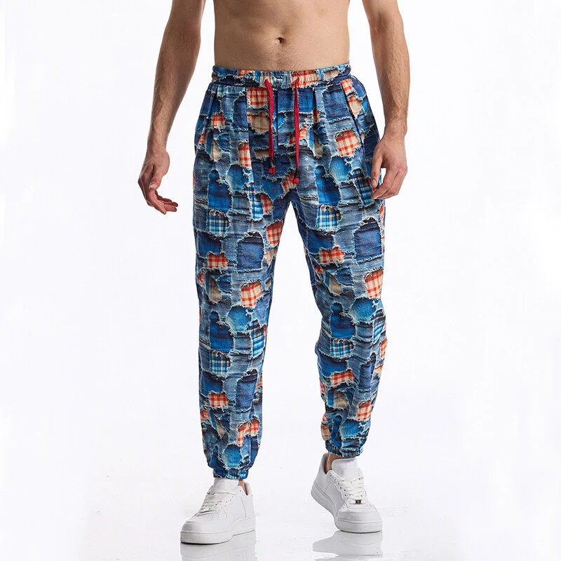 Herren Gemusterte Jogginghose im tapered Schnitt mit elastischem Bund und Tunnelzug Drune