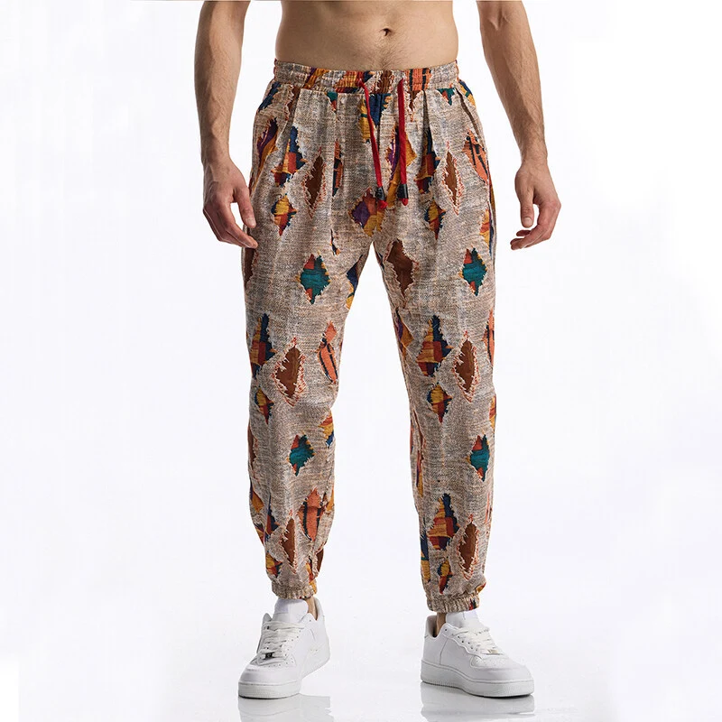 Herren Gemusterte Jogginghose im tapered Schnitt mit elastischem Bund und Tunnelzug Drune