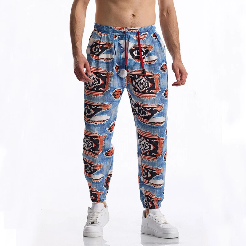Herren Gemusterte Jogginghose im tapered Schnitt mit elastischem Bund und Tunnelzug Drune