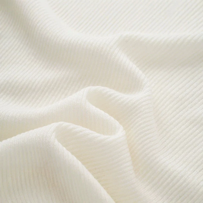 Damen Feinstrick-Top mit V-Ausschnitt, Twist-Detail und figurbetonter Passform Drune