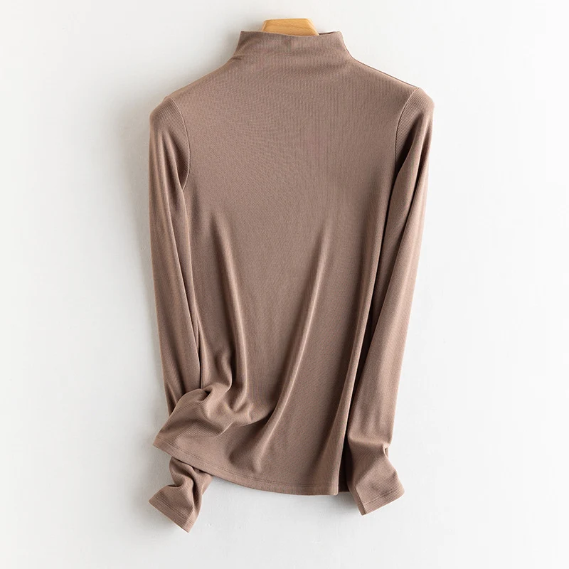 Damen Feines Ripp-Langarmshirt mit Rollkragen und Volantkanten Drune