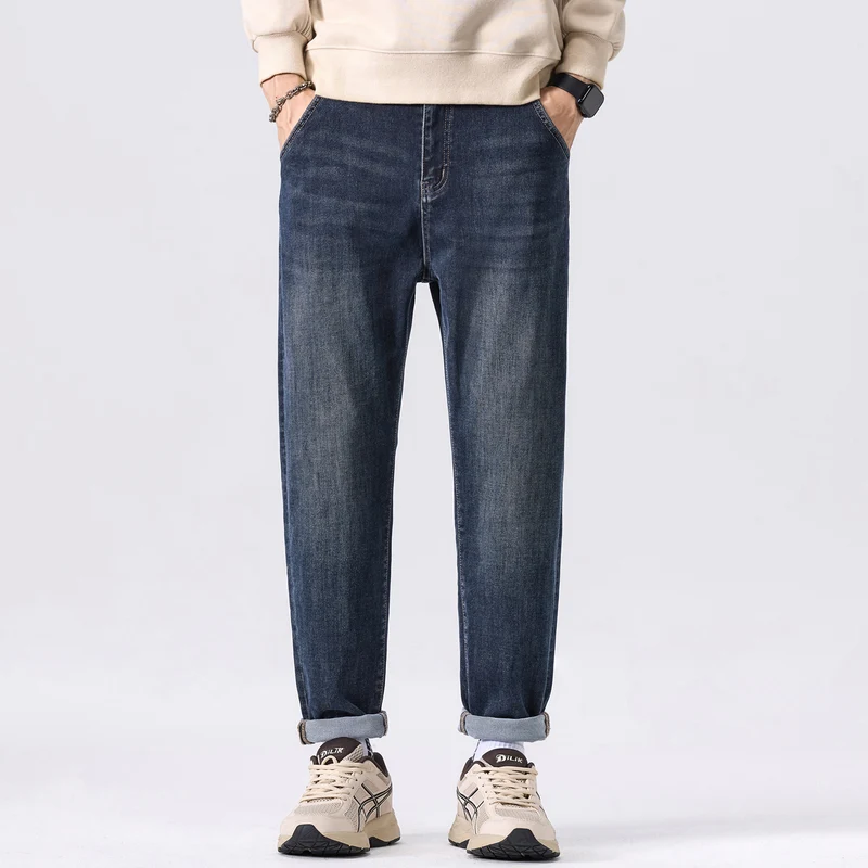 Herren Tapered-Denimhose mit mittelhohem Bund, gekrempeltem Saum und dezenter Used-Waschung Drune