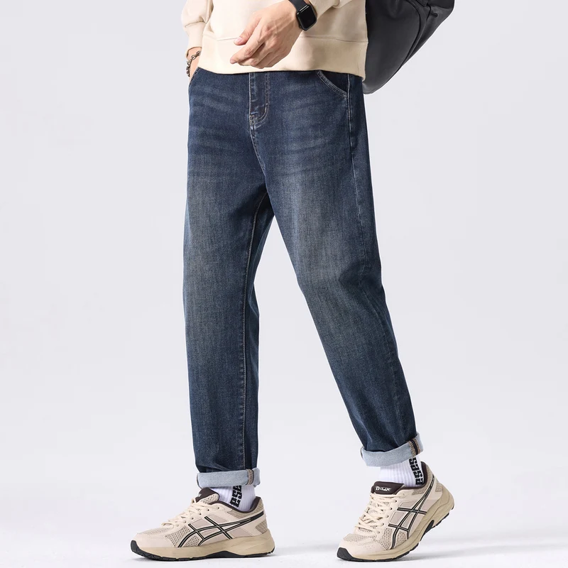 Herren Tapered-Denimhose mit mittelhohem Bund, gekrempeltem Saum und dezenter Used-Waschung Drune