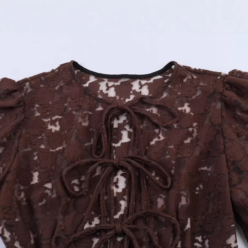 Damen Transparente Spitzenbluse mit frontalen Bindebändern und Volant‑Saum Drune