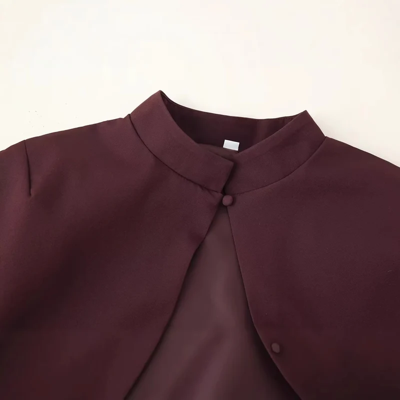 Damen Top mit Capelet-Überwurf und taillierter Peplum‑Silhouette Drune