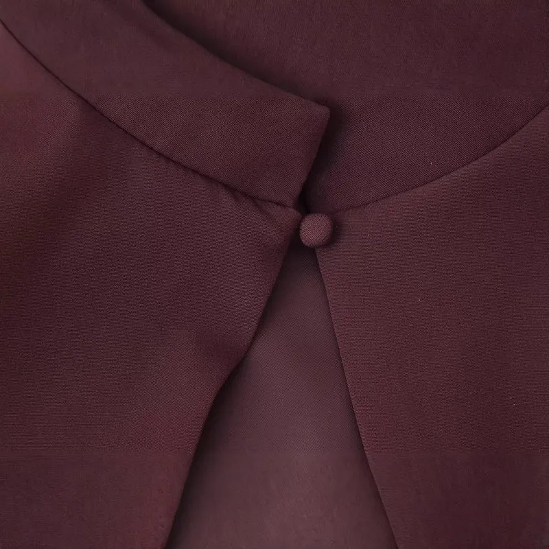 Damen Top mit Capelet-Überwurf und taillierter Peplum‑Silhouette Drune