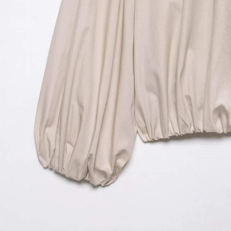 Damen Schluppenbluse im Cropped‑Boxy‑Schnitt mit Ballonärmeln und kontrastierter Schluppenblende Drune