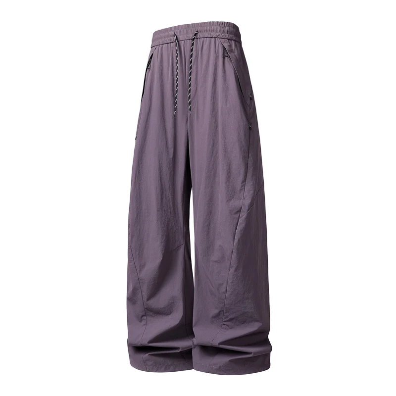 Unisex Weite Tech-Baggy-Hose mit elastischem Kordbund, Reißverschlusstaschen & wasserabweisender Nylonoptik Drune