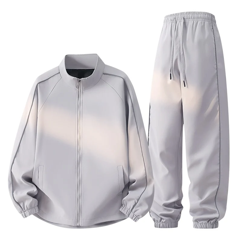 Unisex Tech-Trackset aus ultraleichtem Ripstop mit Stehkragen, Meshfutter & Kordelzughose Drune