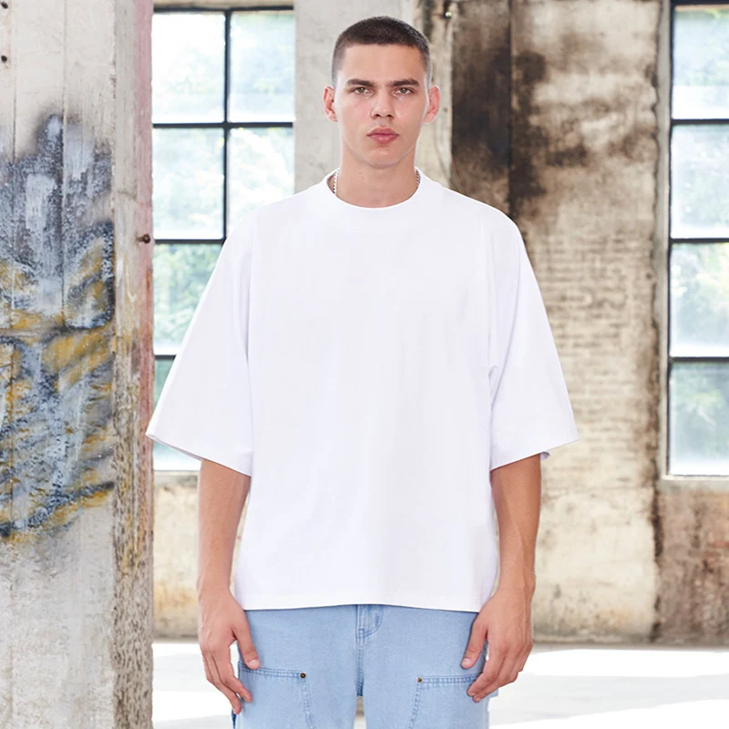Unisex Oversize Boxy T‑Shirt aus schwerer Baumwolle mit weitem Schnitt und verlängerten Ärmeln Drune