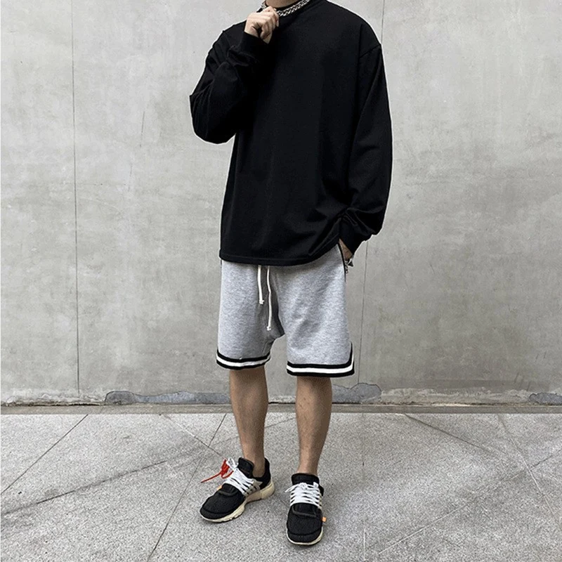 Herren locker sitzende French-Terry Sweatshorts mit Kordelzug und Kontraststreifen Drune