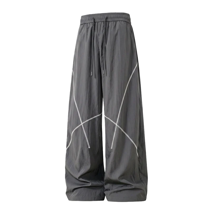 Herren Weite Funktions-Nylonhose mit Kordelbund, reflektierenden Nahtdetails & lässiger Baggy‑Silhouette Drune