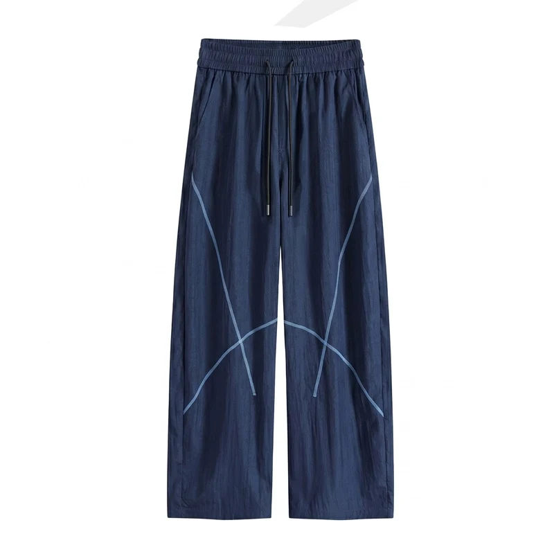 Herren Weite Funktions-Nylonhose mit Kordelbund, reflektierenden Nahtdetails & lässiger Baggy‑Silhouette Drune
