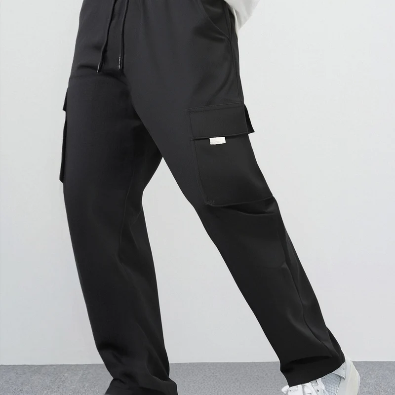 Herren Weite Cargo-Freizeithose aus leichtem Funktionsstoff mit großen Pattentaschen Drune