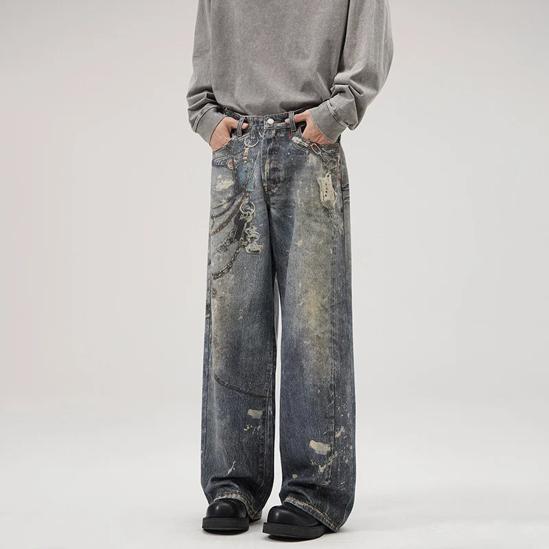 Herren Weit geschnittene Stonewashed-Denim-Jeans mit Kettenprint, Farb‑Splatter und bodenlangem Saum Drune