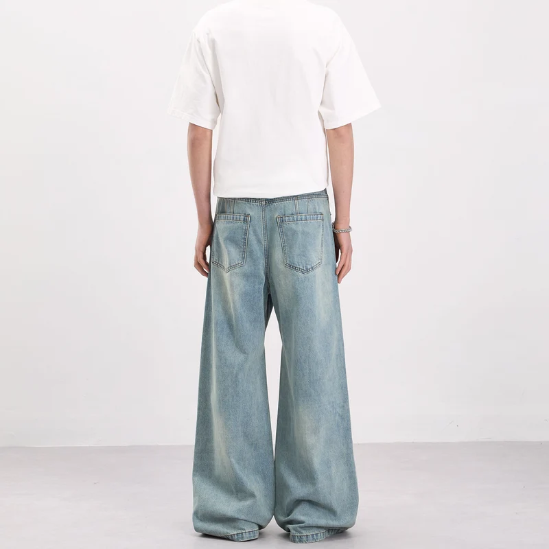 Herren Weit geschnittene Denim-Palazzohose mit geschwungenen Nahtpaneelen und extralangem Saum Drune