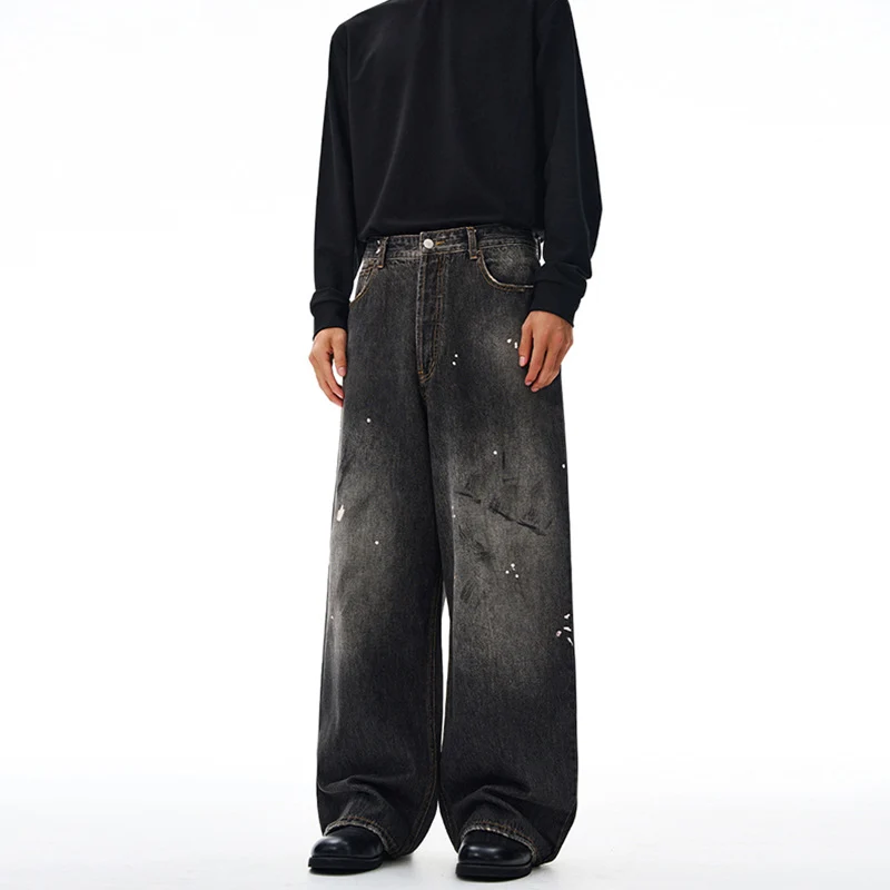 Herren Weit geschnittene Denim-Hose im bodenlangen Baggy-Stil mit dezenter Paint-Splatter-Optik Drune
