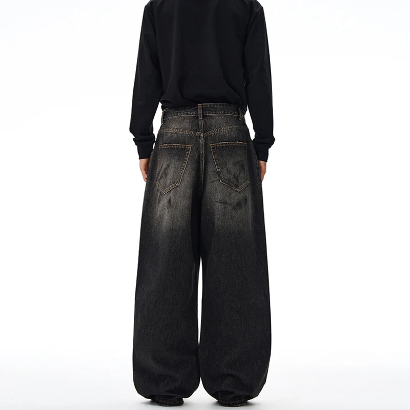 Herren Weit geschnittene Denim-Hose im bodenlangen Baggy-Stil mit dezenter Paint-Splatter-Optik Drune