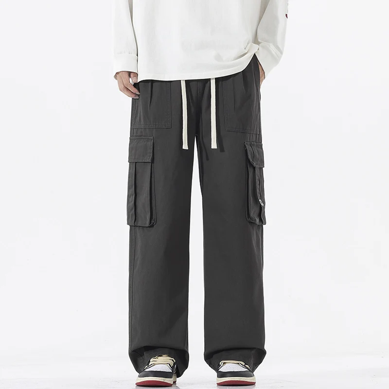 Herren Weit geschnittene Cargo-Hose im Palazzoschnitt mit Tunnelzugbund und XXL-Klappentaschen Drune
