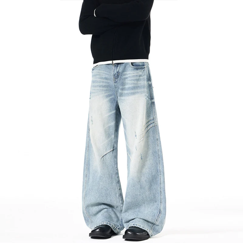 Herren Ultraweite Denim-Palazzohose mit skulpturalen Seitenbahnen und Used‑Effekt Drune