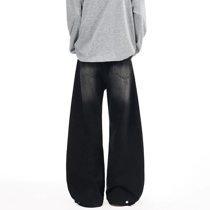 Herren Weitfallende Denim-Palazzo‑Hose mit skulpturalen Nahtpaneelen und bodenlangem Saum Drune