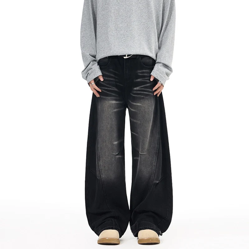 Herren Weitfallende Denim-Palazzo‑Hose mit skulpturalen Nahtpaneelen und bodenlangem Saum Drune