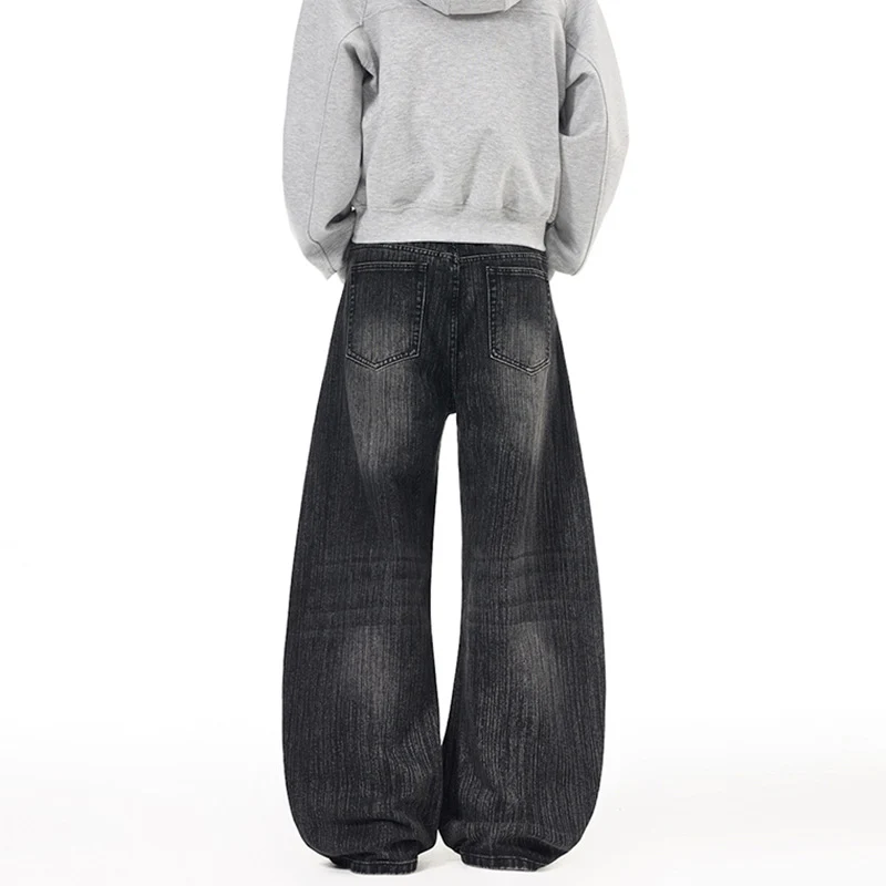 Herren Weite Vintage-inspirierte Denim‑Palazzohose mit verlängerter Saumlage und soften Bleach‑Effekten Drune