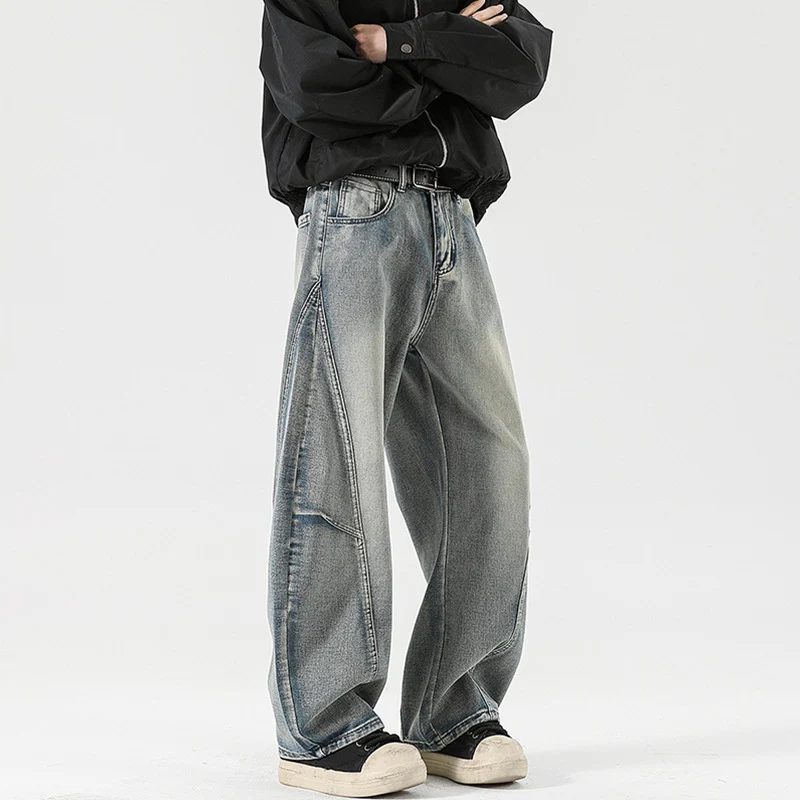 Herren Weite Stonewashed-Paneel-Denimhose mit tiefem Schritt und markanten Ziernähten Drune