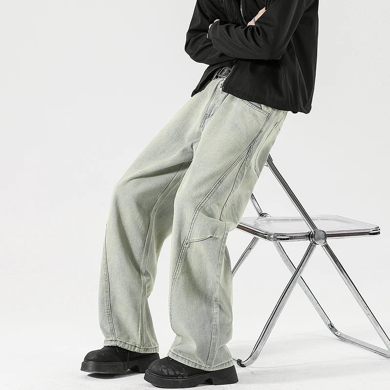 Herren Weite Stonewashed-Paneel-Denimhose mit tiefem Schritt und markanten Ziernähten Drune