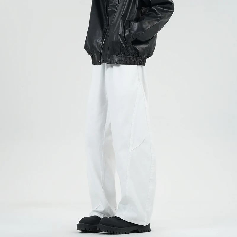 Herren Weite Stonewashed-Paneel-Denimhose mit tiefem Schritt und markanten Ziernähten Drune